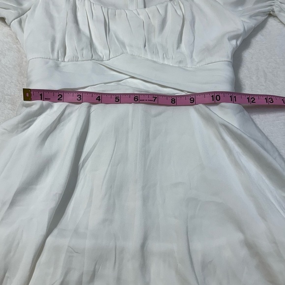 NWT Miami Francesca’s White Satin Tiered Puff Sleeve Romper - Picture 3 of 16